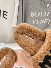 MIUMIU 26S SANDALS IN LIGHT BROWN SHEARLING WITH LOGO LETTERING