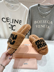 MIUMIU 26S SANDALS IN LIGHT BROWN SHEARLING WITH LOGO LETTERING