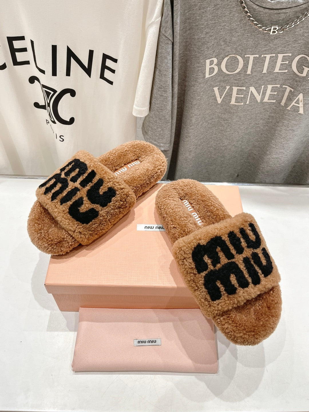 MIUMIU 26S SANDALS IN LIGHT BROWN SHEARLING WITH LOGO LETTERING