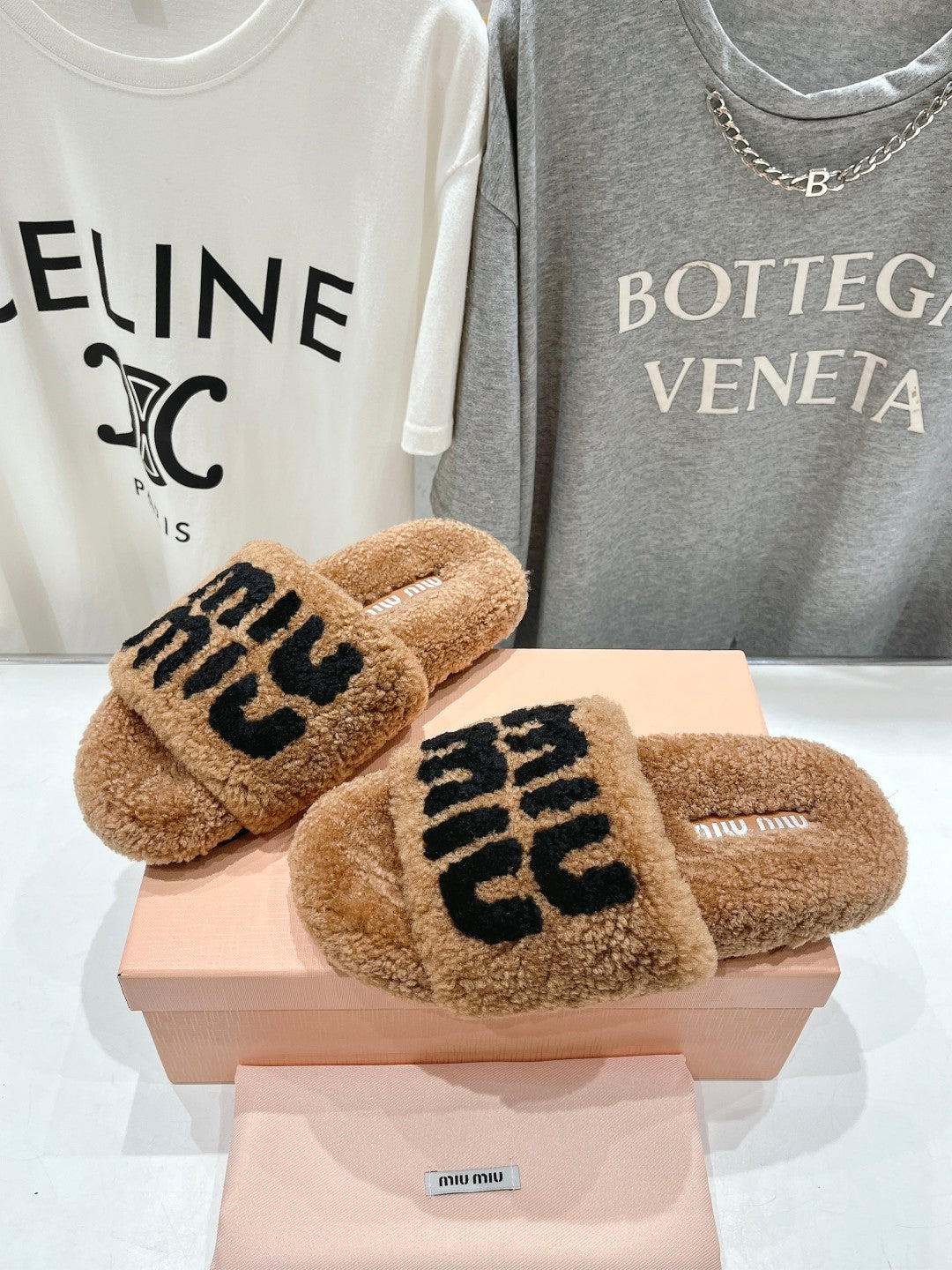 MIUMIU 26S SANDALS IN LIGHT BROWN SHEARLING WITH LOGO LETTERING