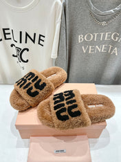 MIUMIU 26S SANDALS IN LIGHT BROWN SHEARLING WITH LOGO LETTERING