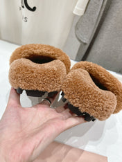 MIUMIU 26S SANDALS IN LIGHT BROWN SHEARLING WITH LOGO LETTERING