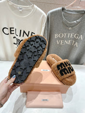 MIUMIU 26S SANDALS IN LIGHT BROWN SHEARLING WITH LOGO LETTERING