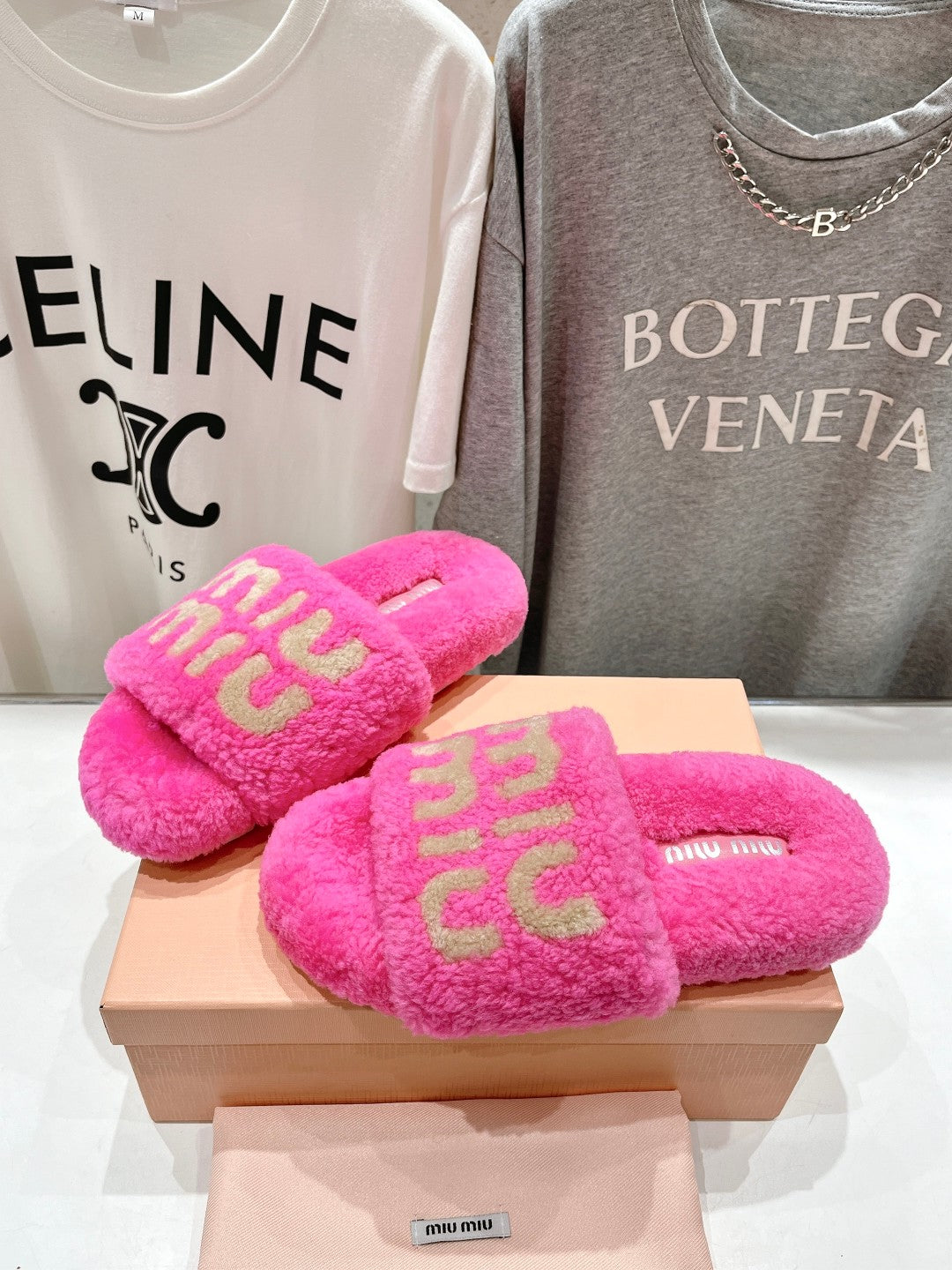 MIUMIU 26S SANDALS IN PINK SHEARLING WITH LOGO LETTERING
