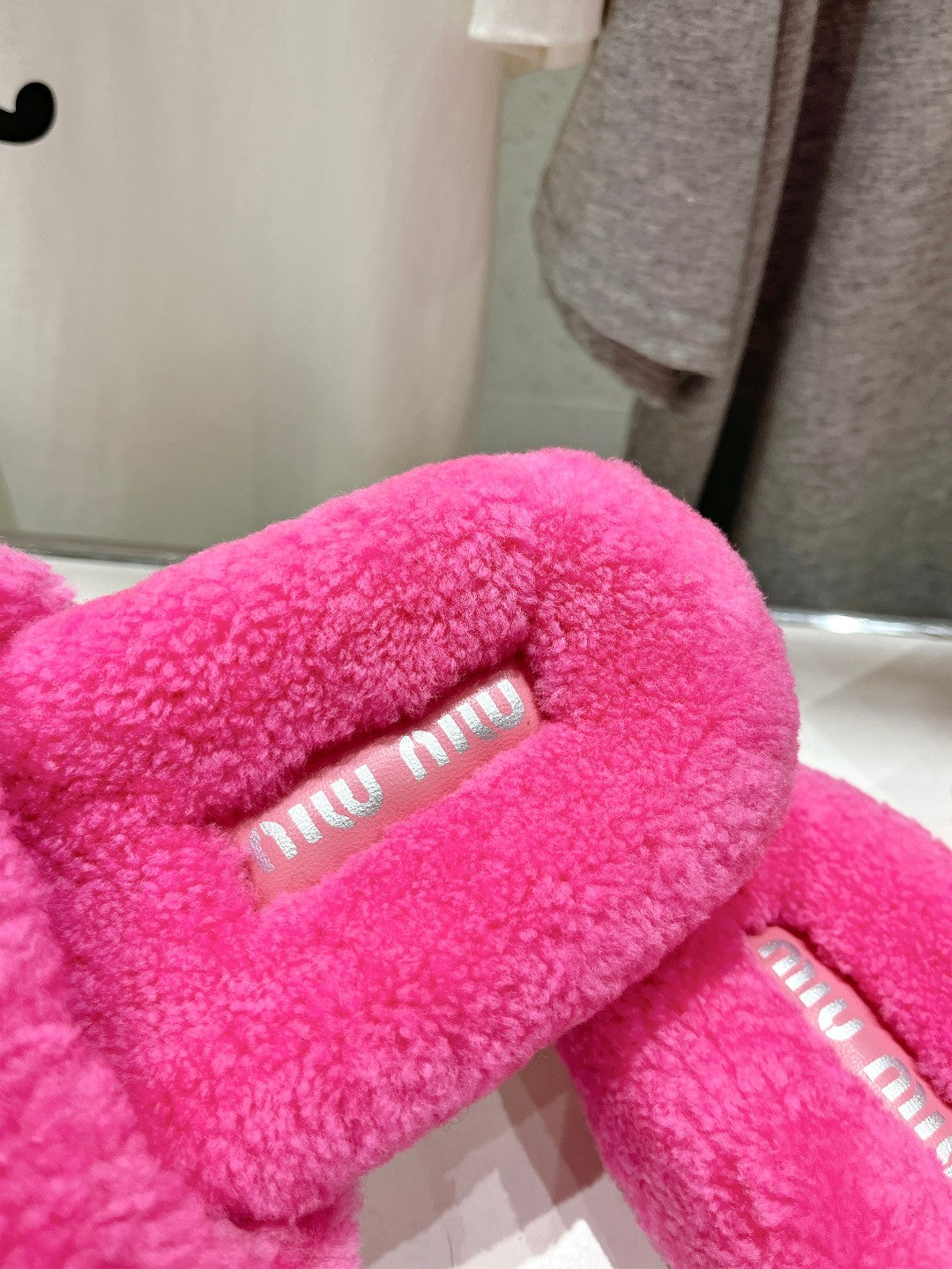 MIUMIU 26S SANDALS IN PINK SHEARLING WITH LOGO LETTERING