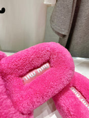 MIUMIU 26S SANDALS IN PINK SHEARLING WITH LOGO LETTERING