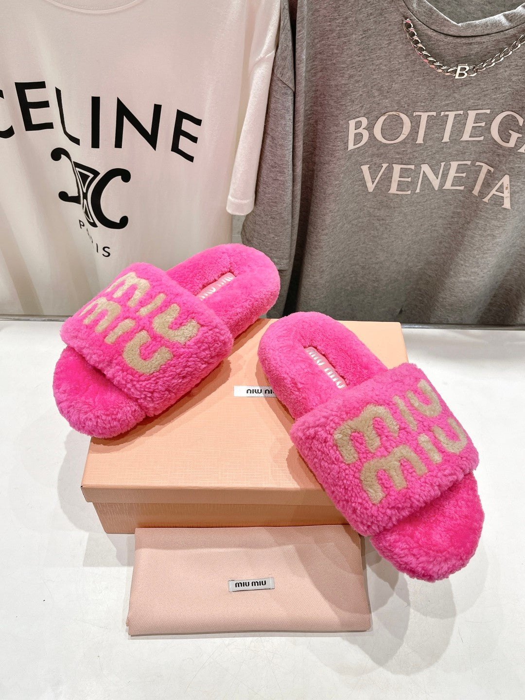 MIUMIU 26S SANDALS IN PINK SHEARLING WITH LOGO LETTERING