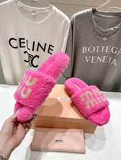 MIUMIU 26S SANDALS IN PINK SHEARLING WITH LOGO LETTERING
