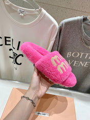 MIUMIU 26S SANDALS IN PINK SHEARLING WITH LOGO LETTERING