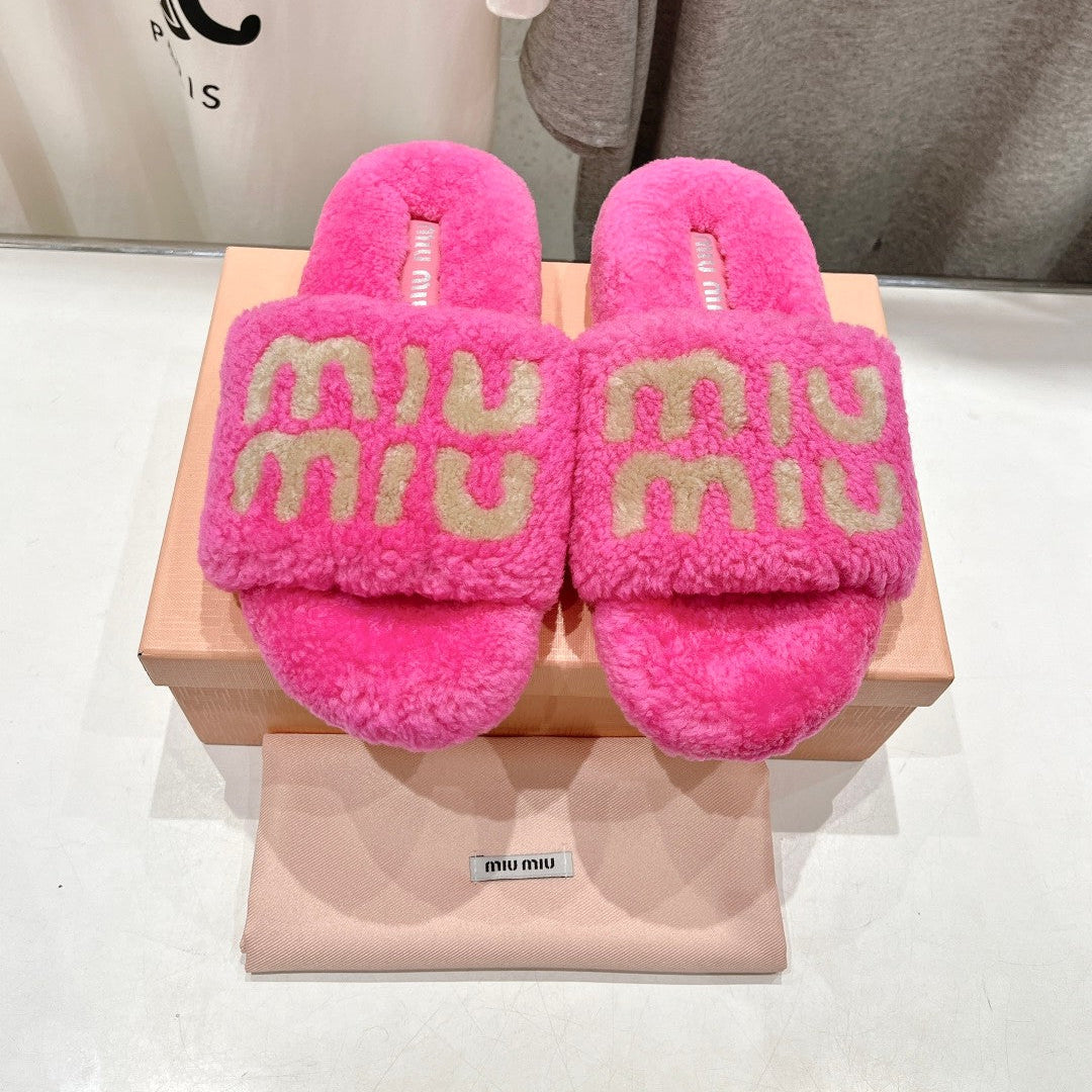 MIUMIU 26S SANDALS IN PINK SHEARLING WITH LOGO LETTERING