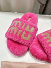 MIUMIU 26S SANDALS IN PINK SHEARLING WITH LOGO LETTERING