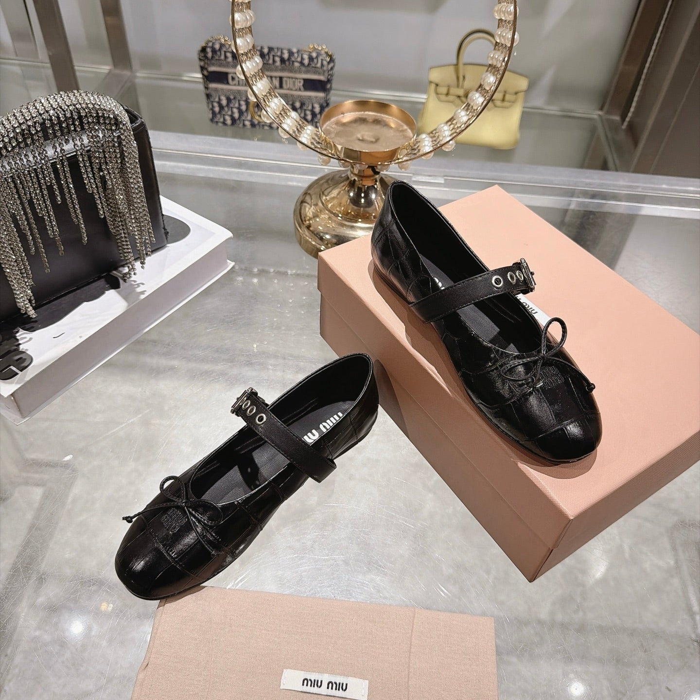 MIUMIU 26S MARY JANE FLATS IN BLACK CROC-EMBOSSED LEATHER