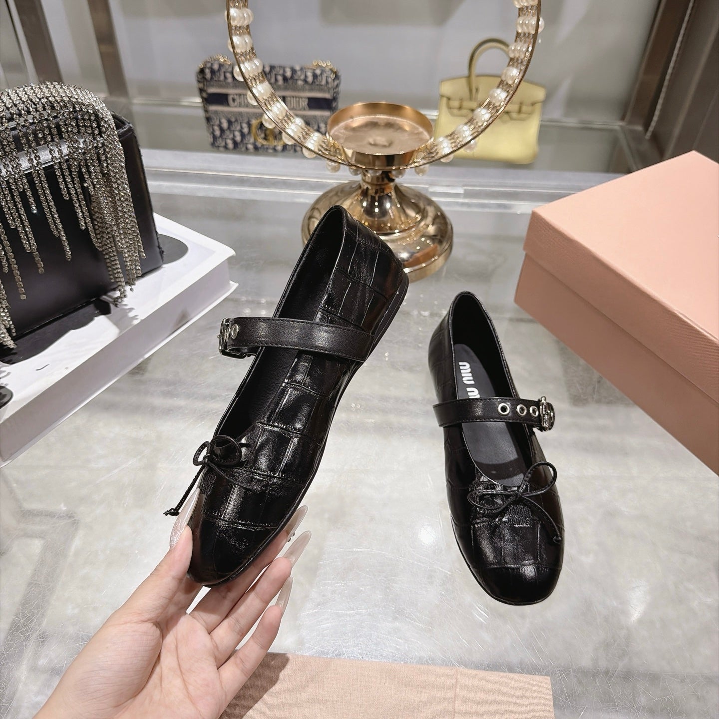 MIUMIU 26S MARY JANE FLATS IN BLACK CROC-EMBOSSED LEATHER