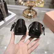 MIUMIU 26S MARY JANE FLATS IN BLACK CROC-EMBOSSED LEATHER