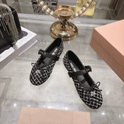 MIUMIU 26S MARY JANE FLATS IN BLACK AND WHITE TWEED FABRIC