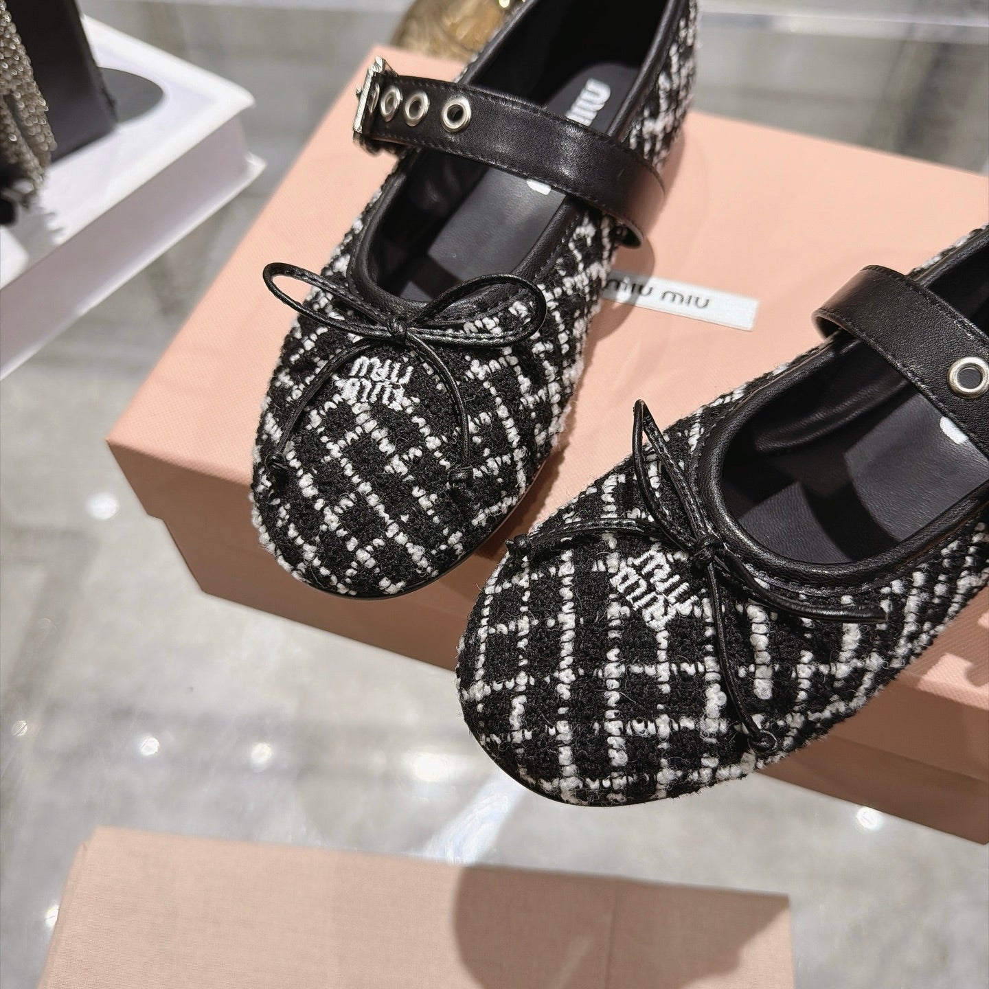 MIUMIU 26S MARY JANE FLATS IN BLACK AND WHITE TWEED FABRIC