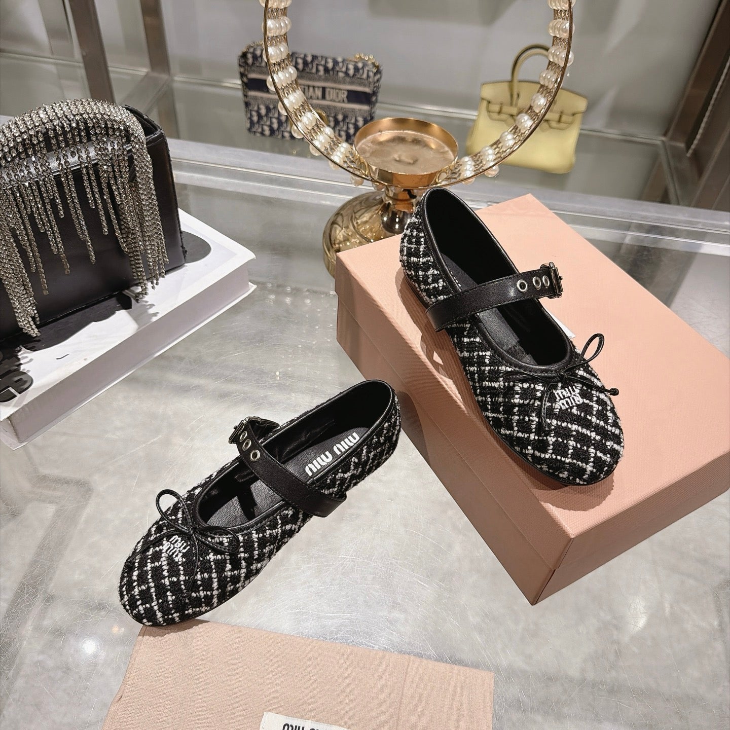 MIUMIU 26S MARY JANE FLATS IN BLACK AND WHITE TWEED FABRIC