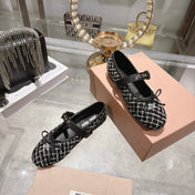 MIUMIU 26S MARY JANE FLATS IN BLACK AND WHITE TWEED FABRIC