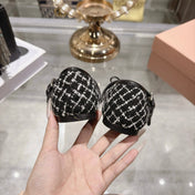 MIUMIU 26S MARY JANE FLATS IN BLACK AND WHITE TWEED FABRIC