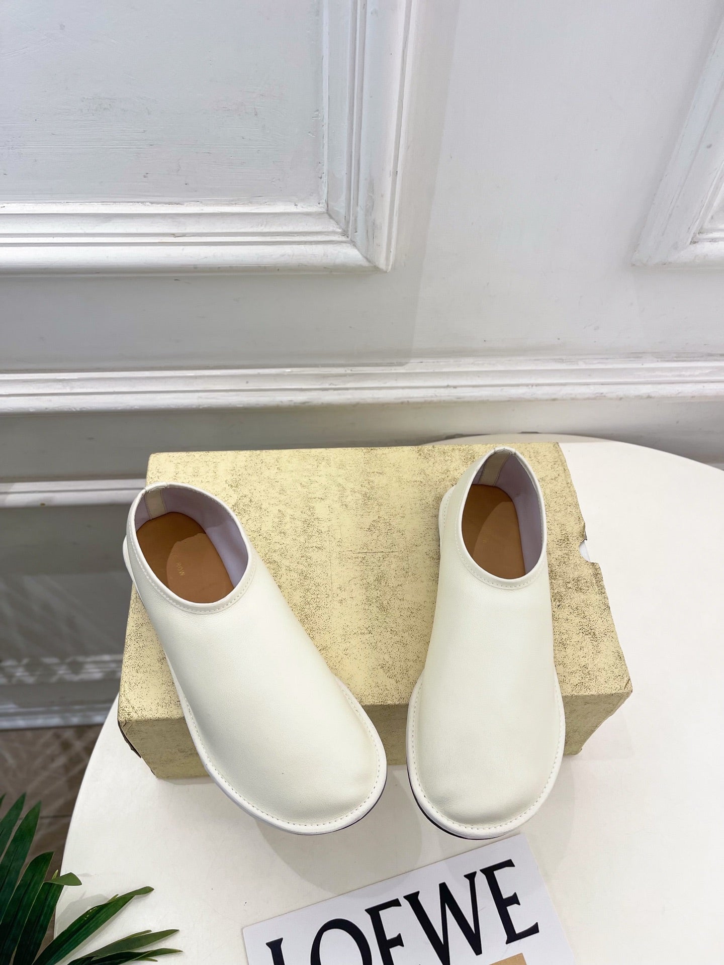 THE ROW 26S SLIP-ON FLATS IN WHITE NAPPA CALFSKIN