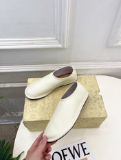 THE ROW 26S SLIP-ON FLATS IN WHITE NAPPA CALFSKIN