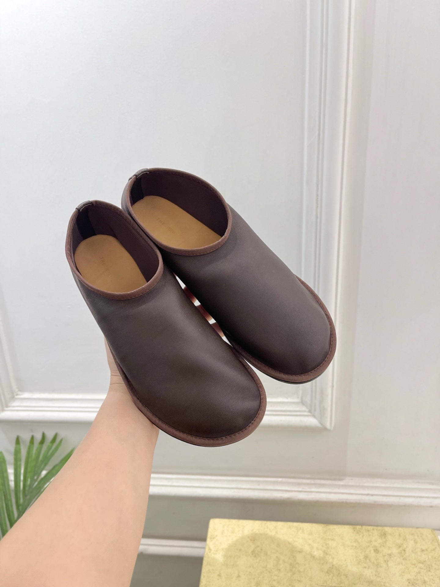 THE ROW 26S SLIP-ON FLATS IN DARK BROWN NAPPA CALFSKIN