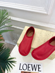 THE ROW 26S SLIP-ON FLATS IN RED NAPPA CALFSKIN