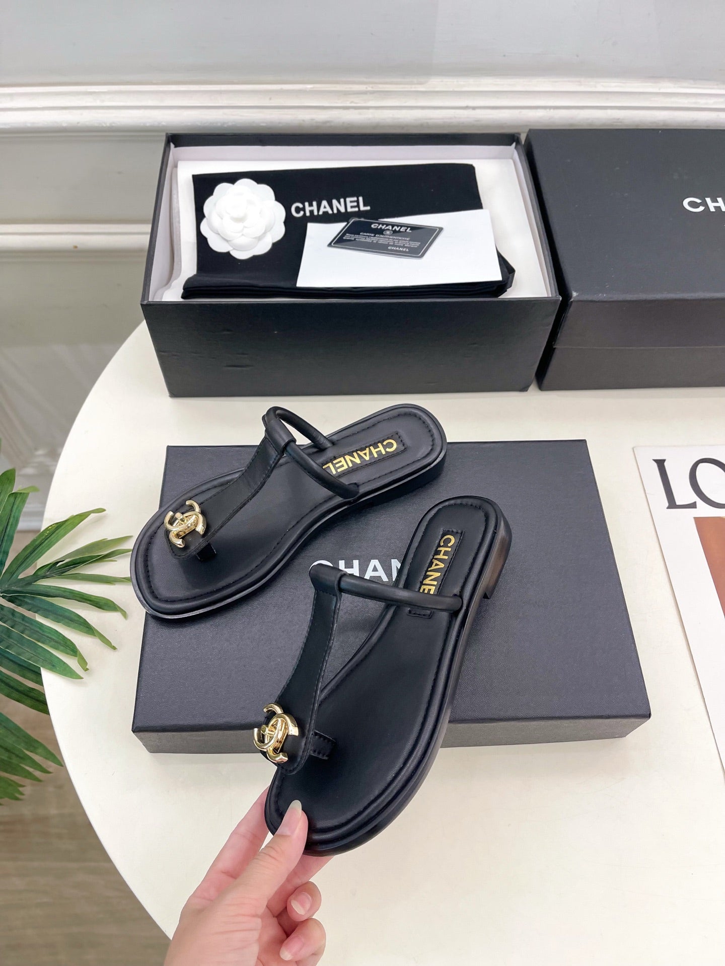 CHANEL 26S THONG SANDALS IN BLACK LAMBSKIN WITH GOLD TONE CC LOGO