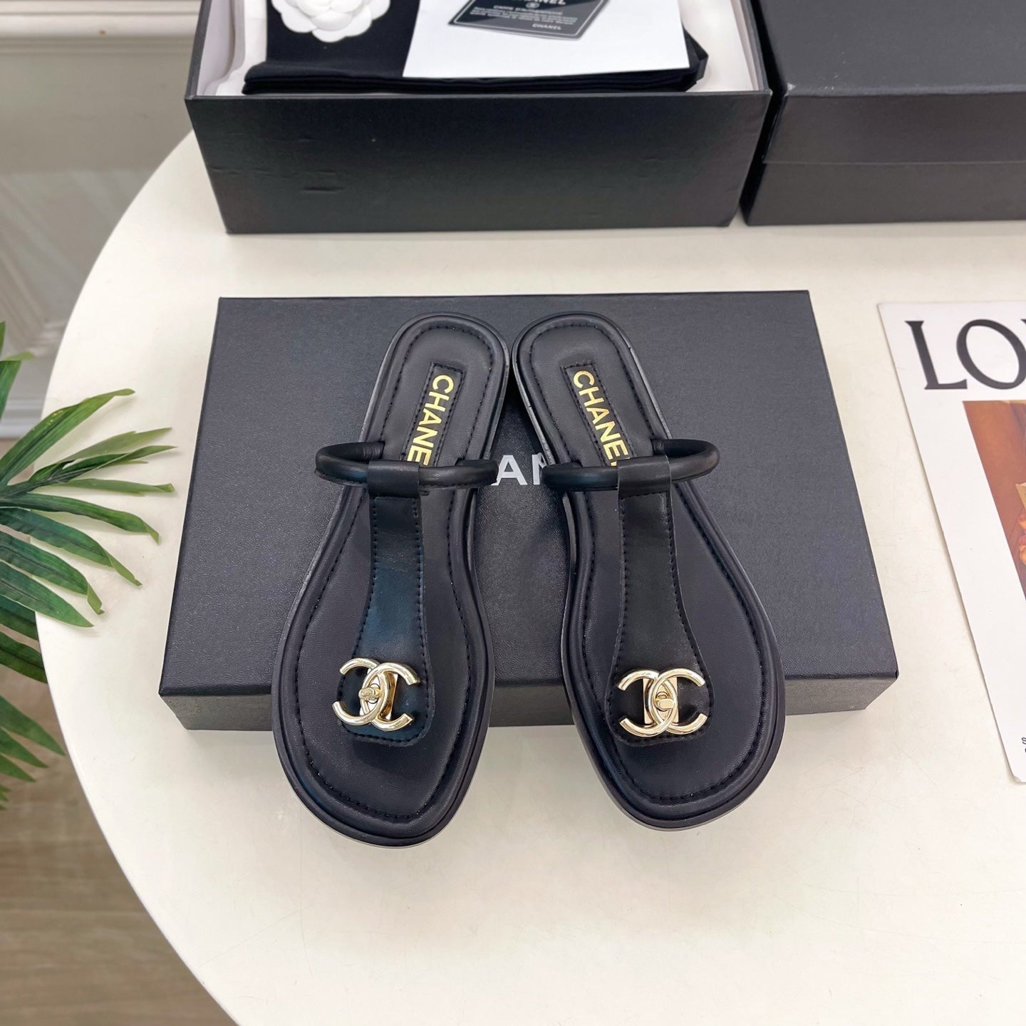 CHANEL 26S THONG SANDALS IN BLACK LAMBSKIN WITH GOLD TONE CC LOGO