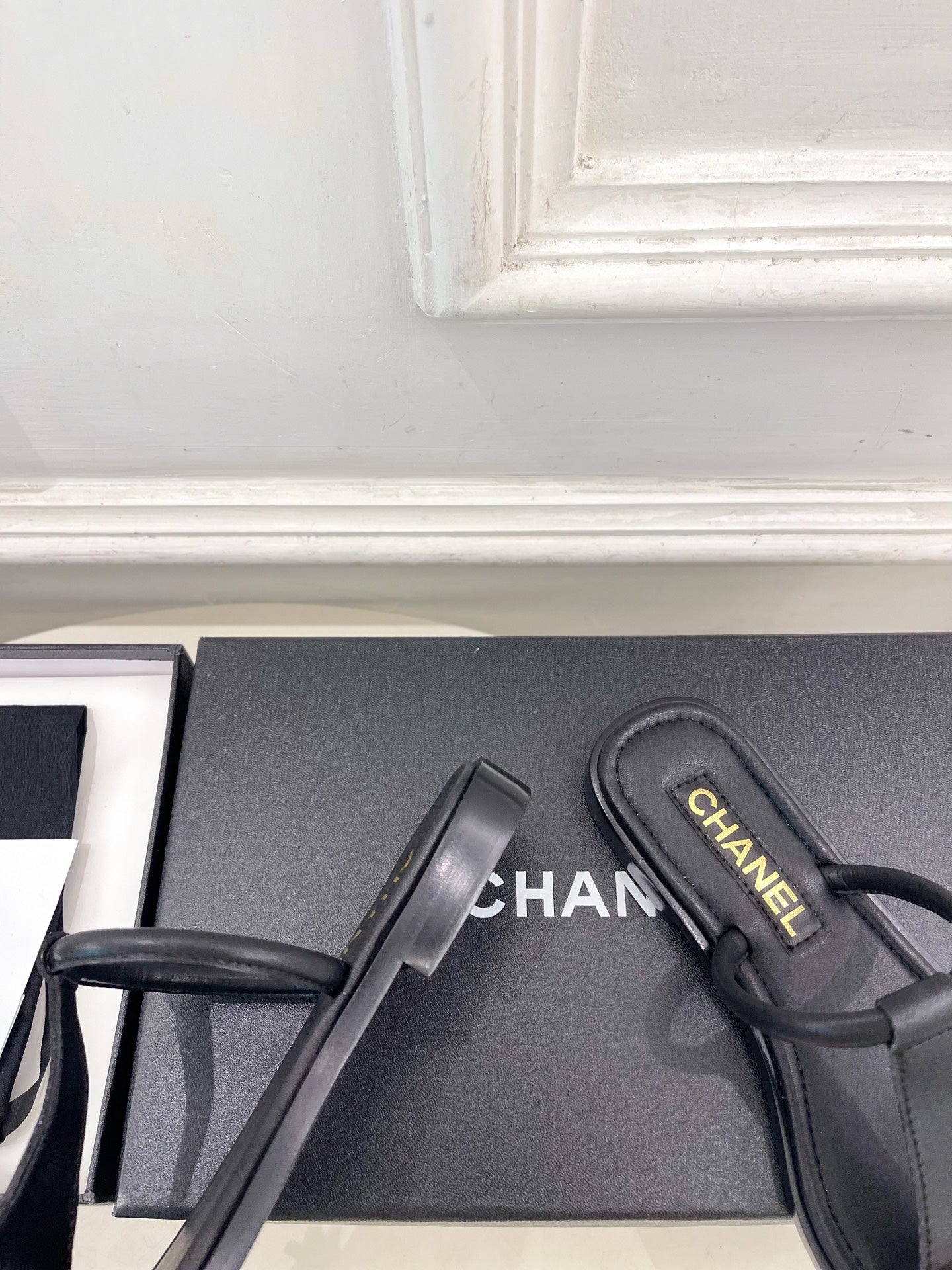 CHANEL 26S THONG SANDALS IN BLACK LAMBSKIN WITH GOLD TONE CC LOGO