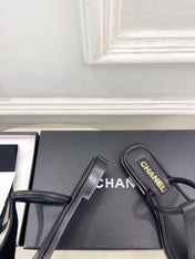 CHANEL 26S THONG SANDALS IN BLACK LAMBSKIN WITH GOLD TONE CC LOGO