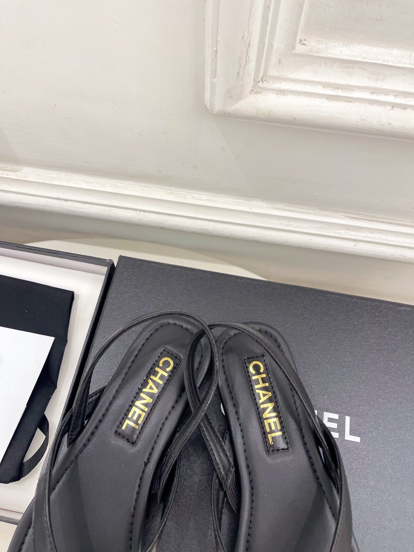 CHANEL 26S THONG SLINGBACK SANDALS IN BLACK LAMBSKIN