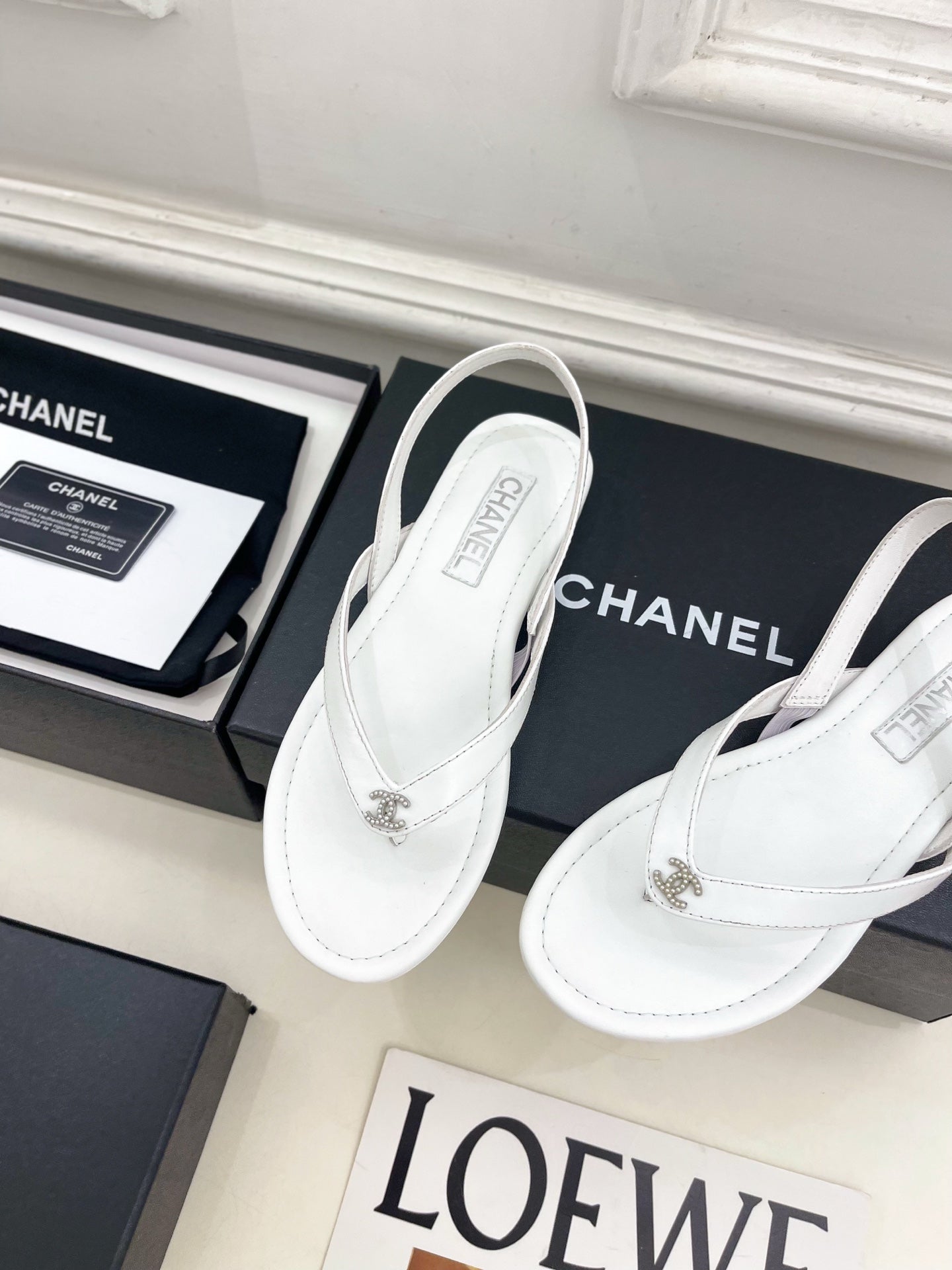 CHANEL 26S THONG SLINGBACK SANDALS IN WHITE LAMBSKIN