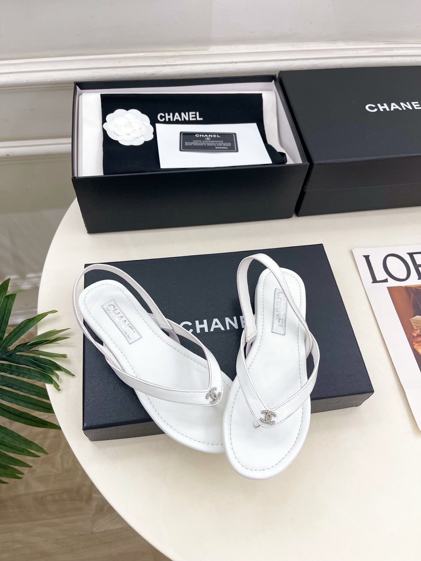 CHANEL 26S THONG SLINGBACK SANDALS IN WHITE LAMBSKIN