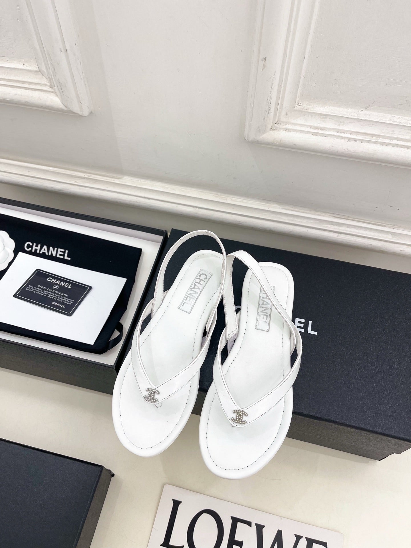 CHANEL 26S THONG SLINGBACK SANDALS IN WHITE LAMBSKIN