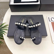 CHANEL 26S THONG SANDALS IN BLACK LAMBSKIN WITH PEARL EMBELLISHMENTS