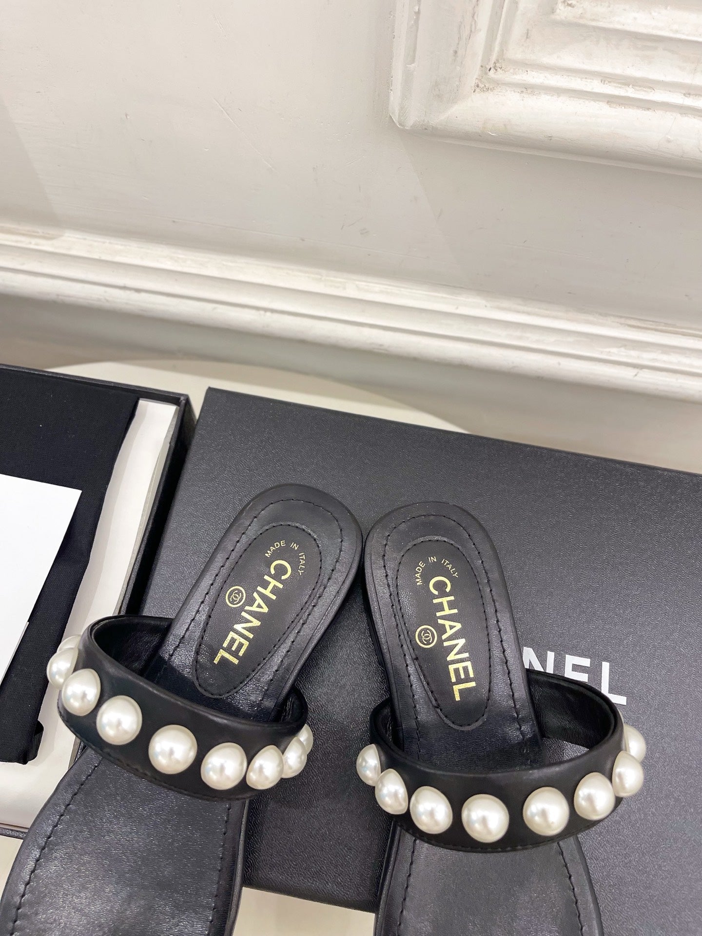 CHANEL 26S THONG SANDALS IN BLACK LAMBSKIN WITH PEARL EMBELLISHMENTS