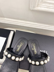 CHANEL 26S THONG SANDALS IN BLACK LAMBSKIN WITH PEARL EMBELLISHMENTS