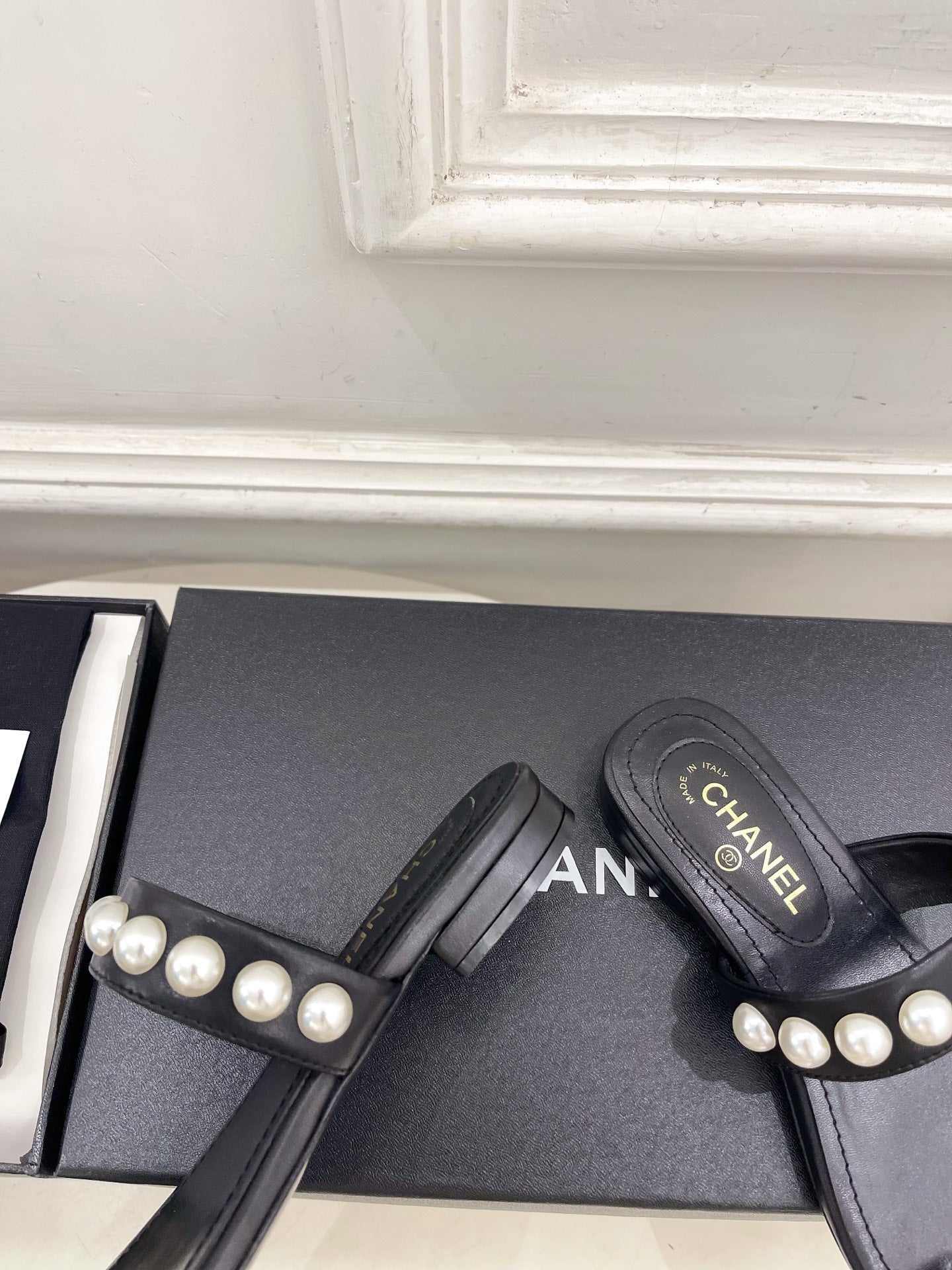CHANEL 26S THONG SANDALS IN BLACK LAMBSKIN WITH PEARL EMBELLISHMENTS