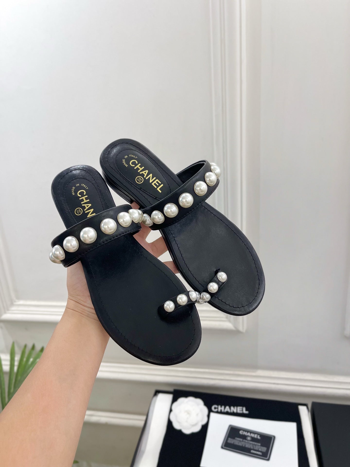 CHANEL 26S THONG SANDALS IN BLACK LAMBSKIN WITH PEARL EMBELLISHMENTS