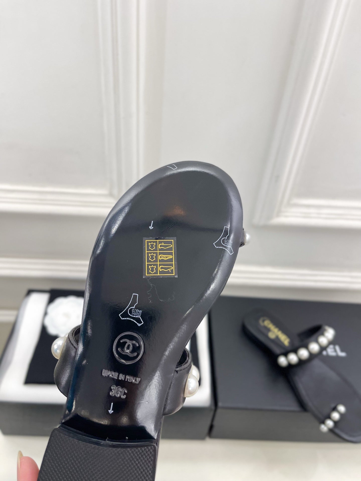 CHANEL 26S THONG SANDALS IN BLACK LAMBSKIN WITH PEARL EMBELLISHMENTS