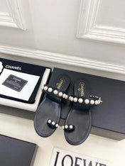 CHANEL 26S THONG SANDALS IN BLACK LAMBSKIN WITH PEARL EMBELLISHMENTS