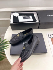 CHANEL 26S LOAFER MULES IN BLACK LAMBSKIN FABRIC