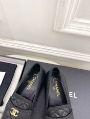 CHANEL 26S LOAFER MULES IN BLACK LAMBSKIN FABRIC