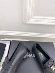 CHANEL 26S LOAFER MULES IN BLACK LAMBSKIN FABRIC