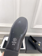 CHANEL 26S LOAFER MULES IN BLACK LAMBSKIN FABRIC