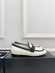 CHANEL 26S LOAFER MULES IN WHITE LAMBSKIN AND BLACK FABRIC