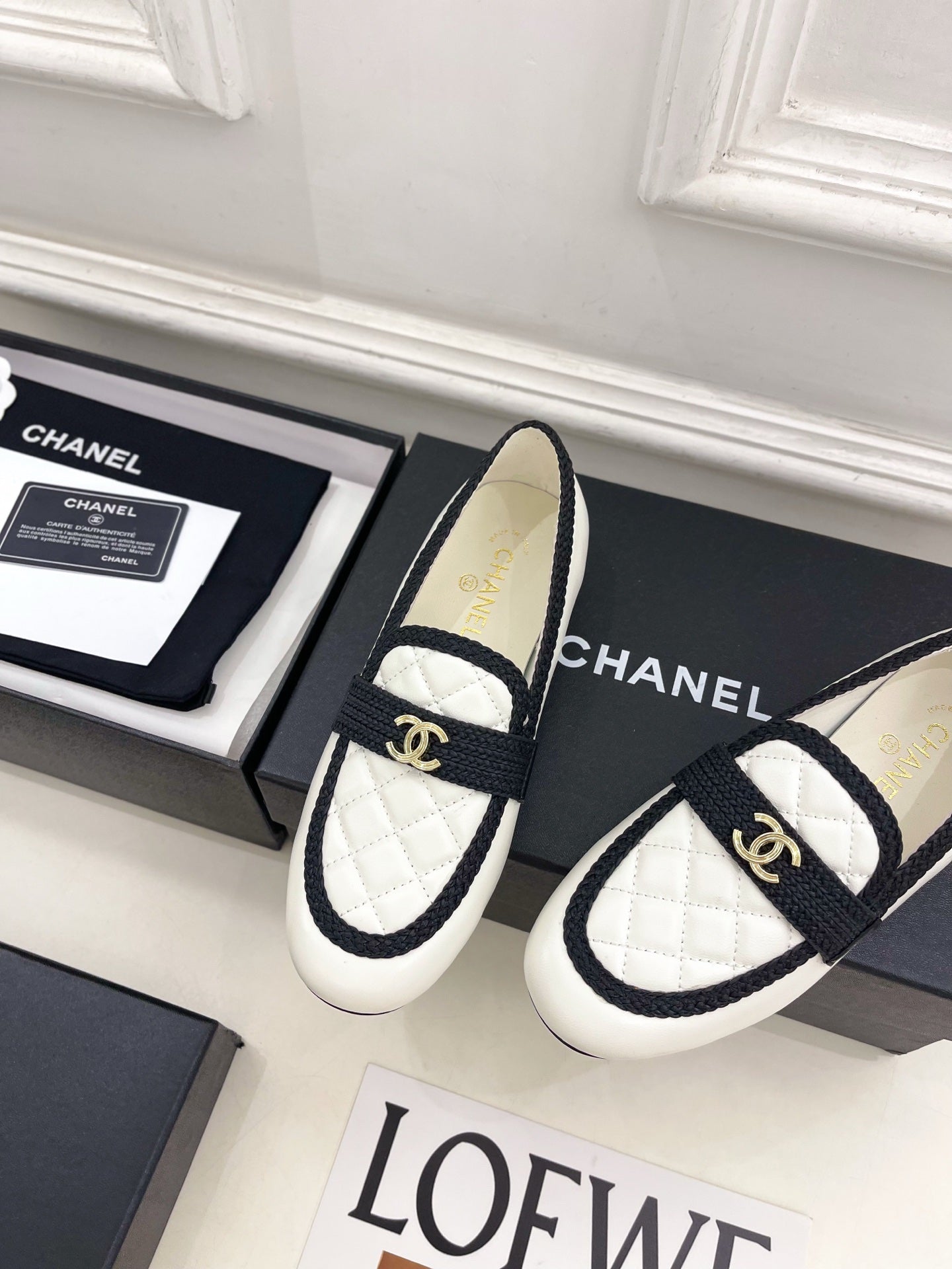 CHANEL 26S LOAFER MULES IN WHITE LAMBSKIN AND BLACK FABRIC