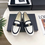 CHANEL 26S LOAFER MULES IN WHITE LAMBSKIN AND BLACK FABRIC
