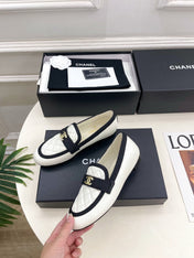 CHANEL 26S LOAFER MULES IN WHITE LAMBSKIN AND BLACK FABRIC